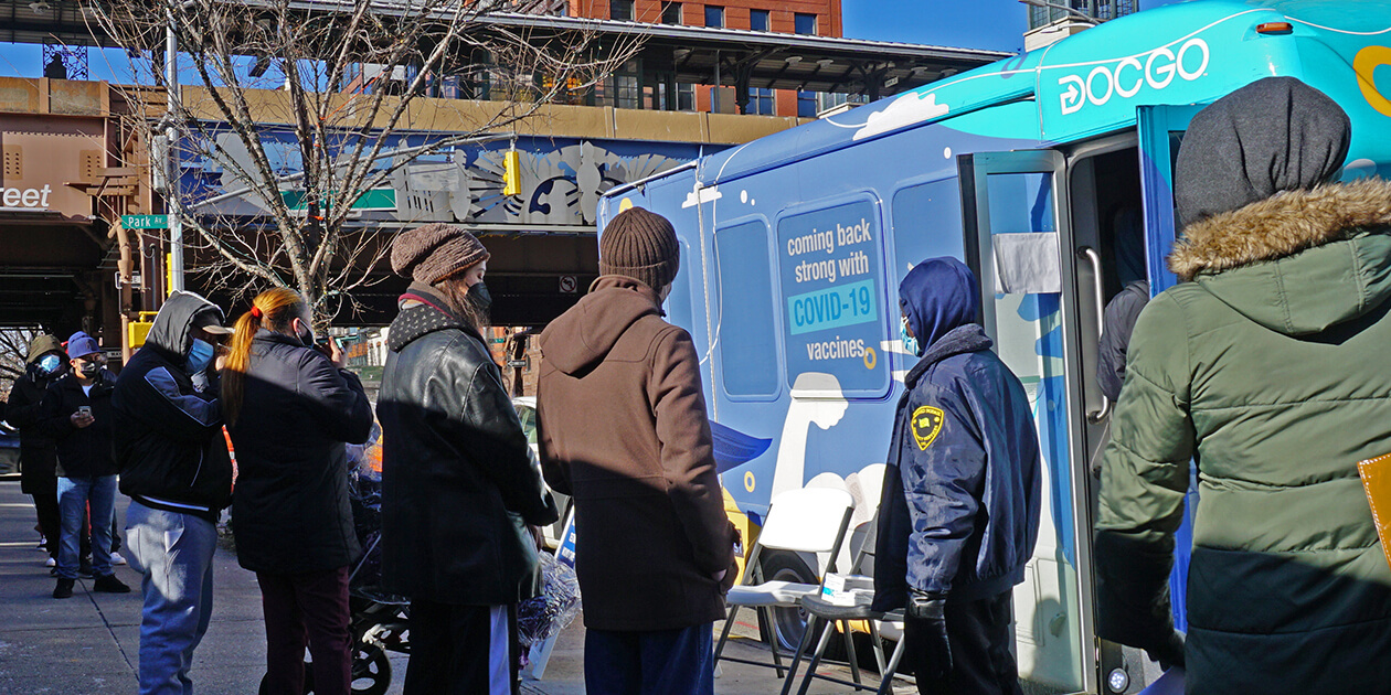In Harlem, a mobile clinic provides COVID-19 vaccines out of a bus.